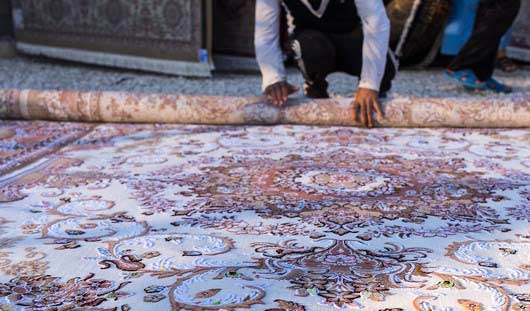 روش اصولی لول کردن قالی در قالیشویی باغ فردوس